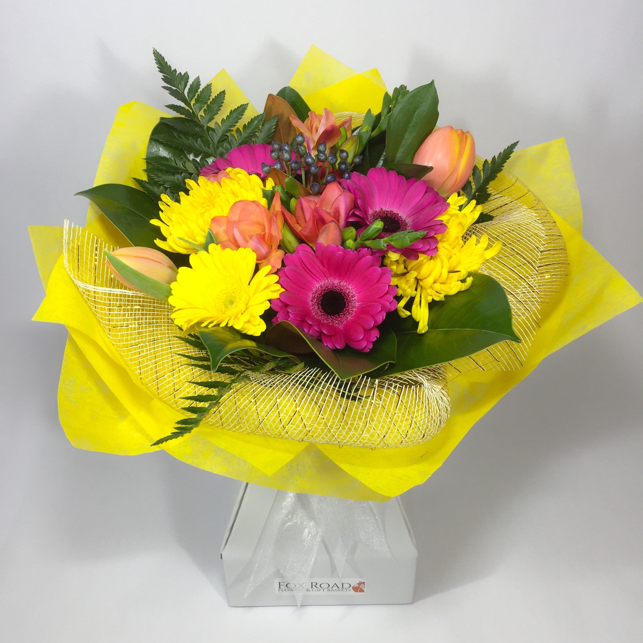 Bright yellow flowers in a Vox Box